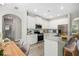 Modern kitchen with white cabinetry, granite countertops, and stainless steel appliances at 458 Ajo Way, Dallas, GA 30157