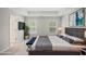 Spacious main bedroom featuring tray ceiling, plush carpet, and abundant natural light at 458 Ajo Way, Dallas, GA 30157