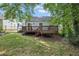 Backyard with a wood deck and grass at 1100 Faith Se Ave, Atlanta, GA 30316