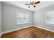 Inviting bedroom with hardwood floors and plenty of natural light from two windows at 1100 Faith Se Ave, Atlanta, GA 30316
