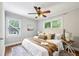 Bedroom featuring a cozy bed and warm lighting at 1100 Faith Se Ave, Atlanta, GA 30316