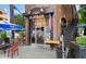 Charming brick building featuring a storefront with inviting outdoor patio seating at 1100 Faith Se Ave, Atlanta, GA 30316