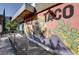Holy Taco showcases vibrant mural art, enhancing the unique character of the building at 1100 Faith Se Ave, Atlanta, GA 30316