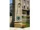 A historic-style fountain, a neighborhood landmark, with a 'Do Not Put Rocks' sign at 1100 Faith Se Ave, Atlanta, GA 30316