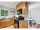 Updated kitchen featuring modern appliances, granite countertops, subway tile backsplash, and plenty of cabinet space at 1100 Faith Se Ave, Atlanta, GA 30316