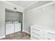 Functional laundry room with washer, dryer, storage cabinet, and stylish flooring at 1100 Faith Se Ave, Atlanta, GA 30316
