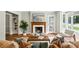 Bright living room boasting hardwood floors, fireplace, built-in shelving, and cozy seating at 1100 Faith Se Ave, Atlanta, GA 30316
