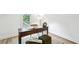 Bright office space with a large desk and natural light at 1100 Faith Se Ave, Atlanta, GA 30316