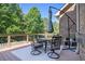 Back deck with outdoor seating, a table and an umbrella at 2628 Hollow Pne, Conyers, GA 30094
