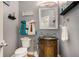 Charming powder room features grey walls and decorative vanity with sink at 2628 Hollow Pne, Conyers, GA 30094