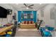 Home bonus room furnished with drum set, DJ turn table, sofa, and electric keyboard at 2628 Hollow Pne, Conyers, GA 30094