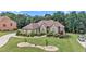 Charming single-story home featuring a well-manicured lawn and lush landscaping at 2628 Hollow Pne, Conyers, GA 30094