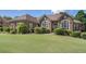 Attractive brick home with a beautifully maintained lawn at 2628 Hollow Pne, Conyers, GA 30094
