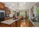 The kitchen area has a view of the dining room and features an island cooktop at 2628 Hollow Pne, Conyers, GA 30094