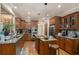 Spacious kitchen features granite countertops and stainless steel appliances at 2628 Hollow Pne, Conyers, GA 30094