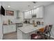 Modern kitchen featuring granite countertops, stainless steel appliances, and pendant lighting at 2628 Hollow Pne, Conyers, GA 30094