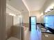 Bathroom featuring double sinks, walk-in shower, and separate bathtub at 390 17Th Nw St # 6001, Atlanta, GA 30363