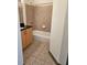 Tiled bathroom with a shower-tub combo and vanity with black countertop at 390 17Th Nw St # 6001, Atlanta, GA 30363