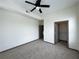 Bright bedroom with two doors and a view into a closet at 390 17Th Nw St # 6001, Atlanta, GA 30363