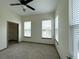 Well-lit bedroom features a closet and bright windows at 390 17Th Nw St # 6001, Atlanta, GA 30363
