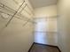 An organized walk-in closet with wire shelving is designed for optimal storage at 390 17Th Nw St # 6001, Atlanta, GA 30363