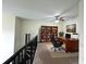 Home office showcasing a wood desk, bookcase, and ample space for work or study at 390 17Th Nw St # 6001, Atlanta, GA 30363