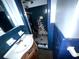 This bathroom features a sink and shower at 668 Lynn Sw Cir, Atlanta, GA 30311