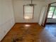Dining room featuring hardwood flooring, a window, and a ceiling light at 668 Lynn Sw Cir, Atlanta, GA 30311