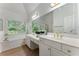 Bathroom featuring double sink vanity and soaking tub at 1575 Wynridge Pointe, Alpharetta, GA 30005