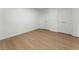 Bedroom featuring wood floors and double closets at 1575 Wynridge Pointe, Alpharetta, GA 30005