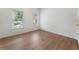 Bedroom with wood floors featuring lots of natural light at 1575 Wynridge Pointe, Alpharetta, GA 30005