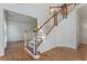 Staircase featuring hardwood stairs with white wood railing at 1575 Wynridge Pointe, Alpharetta, GA 30005