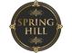 Spring Hill community logo with ornate gold pattern set in a circular frame at 2610 Lisa Sw Dr, Atlanta, GA 30311