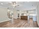 Spacious kitchen with hardwood floors, stainless steel appliances, and a large center island with bar seating at 2610 Lisa Sw Dr, Atlanta, GA 30311