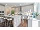 Bright kitchen with large island, stainless steel appliances, and sleek white and gray cabinetry at 2610 Lisa Sw Dr, Atlanta, GA 30311
