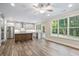 Open-concept kitchen with stainless steel appliances, a center island, and scenic views, an entertainer's dream at 2610 Lisa Sw Dr, Atlanta, GA 30311