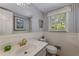 Bathroom features a marble sink, mirror, and natural light at 4774 Olde Village Ln, Atlanta, GA 30338