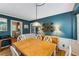 Dining area with table and chairs with an adjacent kitchen at 4774 Olde Village Ln, Atlanta, GA 30338