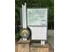 Informational sign for Brook Run Park, featuring a map and trail etiquette, at this community attraction at 4774 Olde Village Ln, Atlanta, GA 30338