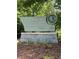 Welcome to Brook Run Park! Sign features Dunwoody affiliation and attractive landscaping at 4774 Olde Village Ln, Atlanta, GA 30338