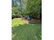 Community playground featuring swings, a slide, and climbing structure, perfect for Gathering fun and recreation at 4774 Olde Village Ln, Atlanta, GA 30338