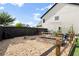 Beautiful backyard featuring raised garden beds with gravel ground cover, perfect for gardening enthusiasts at 6235 Crescent Landing Dr, Cumming, GA 30028