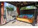 Relaxing backyard lounge with a covered pergola, comfortable seating, and stylish decor at 6235 Crescent Landing Dr, Cumming, GA 30028