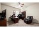 Comfortable home office with plush chair, office furniture, and natural light at 6235 Crescent Landing Dr, Cumming, GA 30028