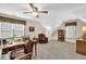 Cozy bonus room featuring neutral carpeting, ceiling fan, and versatile layout for office or relaxation at 4373 Mikandy Nw Dr, Kennesaw, GA 30144
