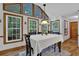 Bright eat-in area with large windows, hardwood floors, and natural light at 4373 Mikandy Nw Dr, Kennesaw, GA 30144