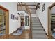 Welcoming foyer features hardwood floors, staircase, and views into other living spaces at 4373 Mikandy Nw Dr, Kennesaw, GA 30144