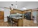 Modern kitchen with island, stainless appliances, granite counters and hardwood flooring at 4373 Mikandy Nw Dr, Kennesaw, GA 30144
