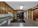 Modern kitchen boasts stainless appliances, granite counters, and wood cabinets at 4373 Mikandy Nw Dr, Kennesaw, GA 30144