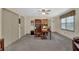 Spacious carpeted office with built-in bookcase and a window for natural light at 4373 Mikandy Nw Dr, Kennesaw, GA 30144